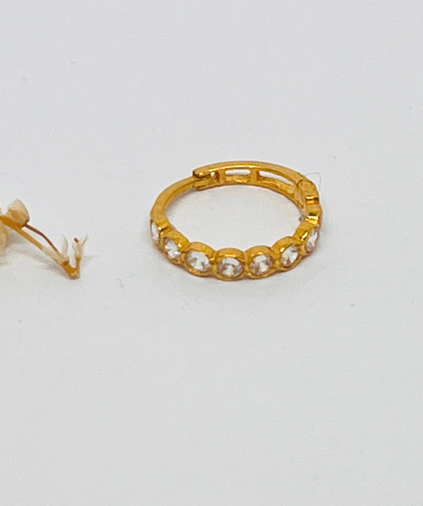 Single Huggie with 8 white stones
