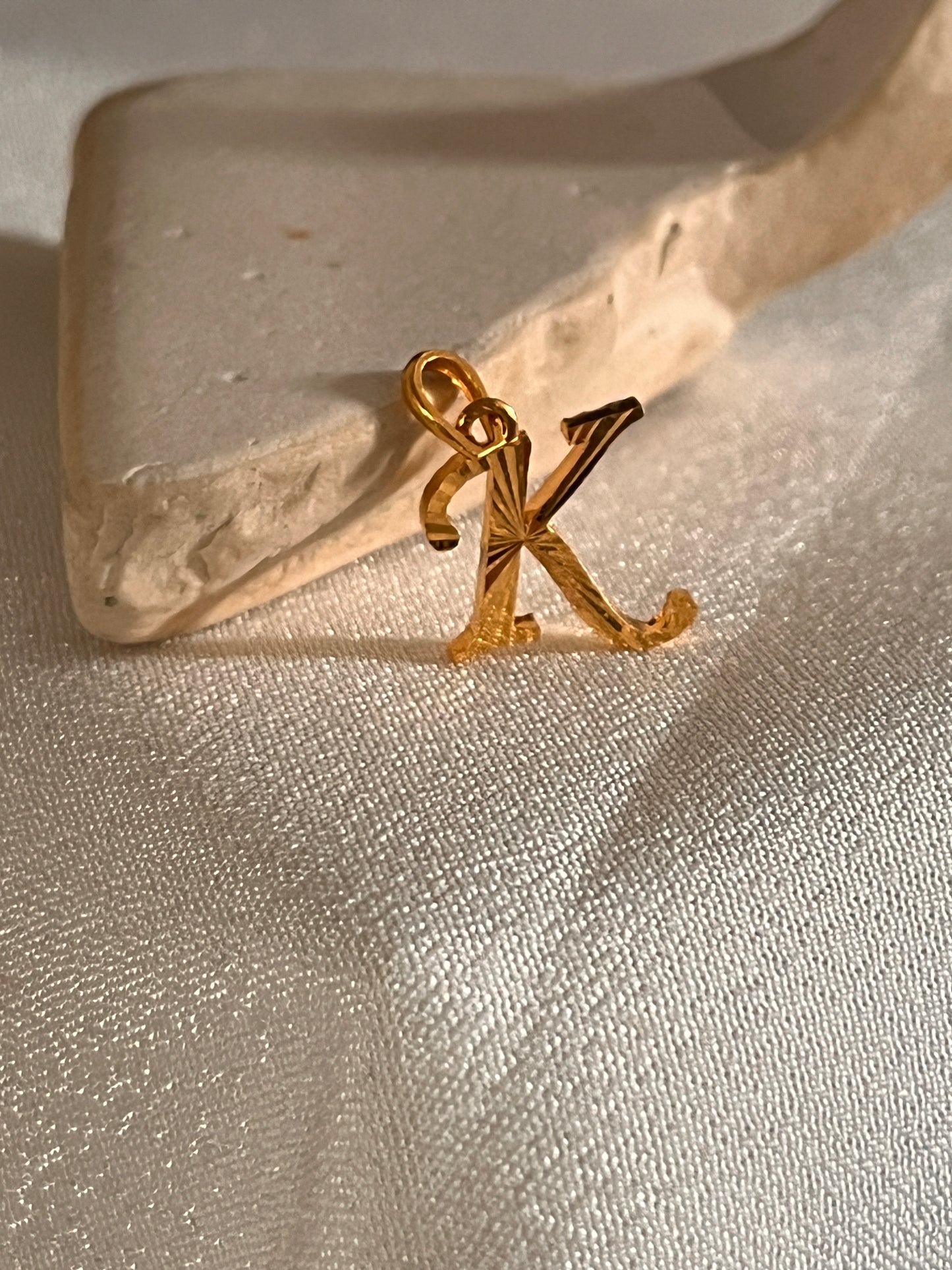 ‘K’ Initial