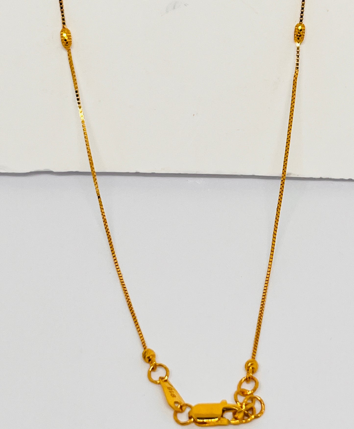 Mini ball and oval detail necklace