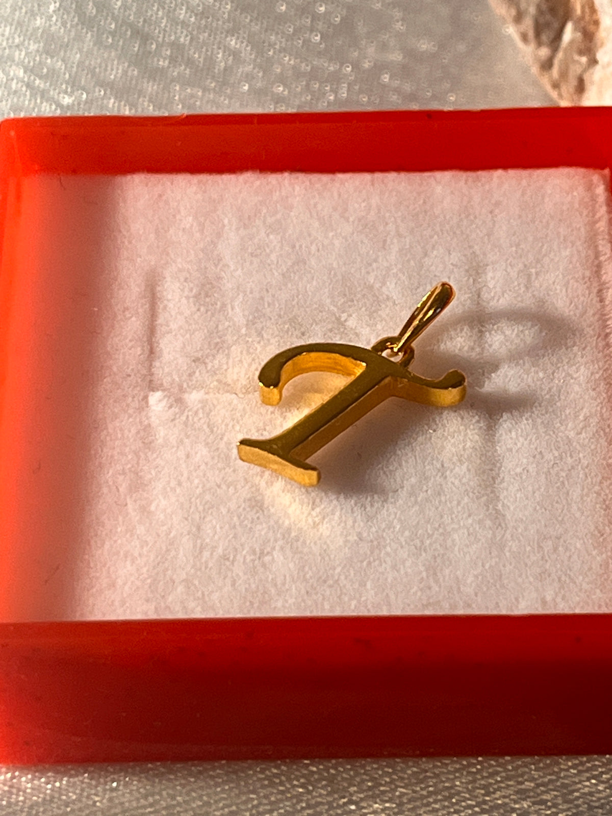 ‘T’ Initial