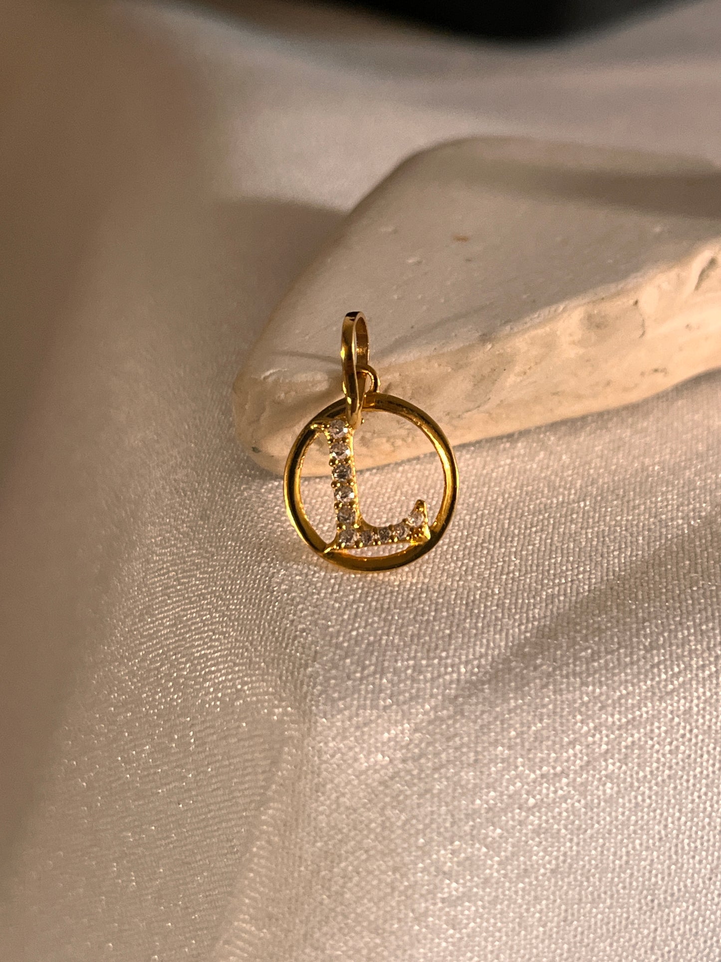 ‘L’ Initial